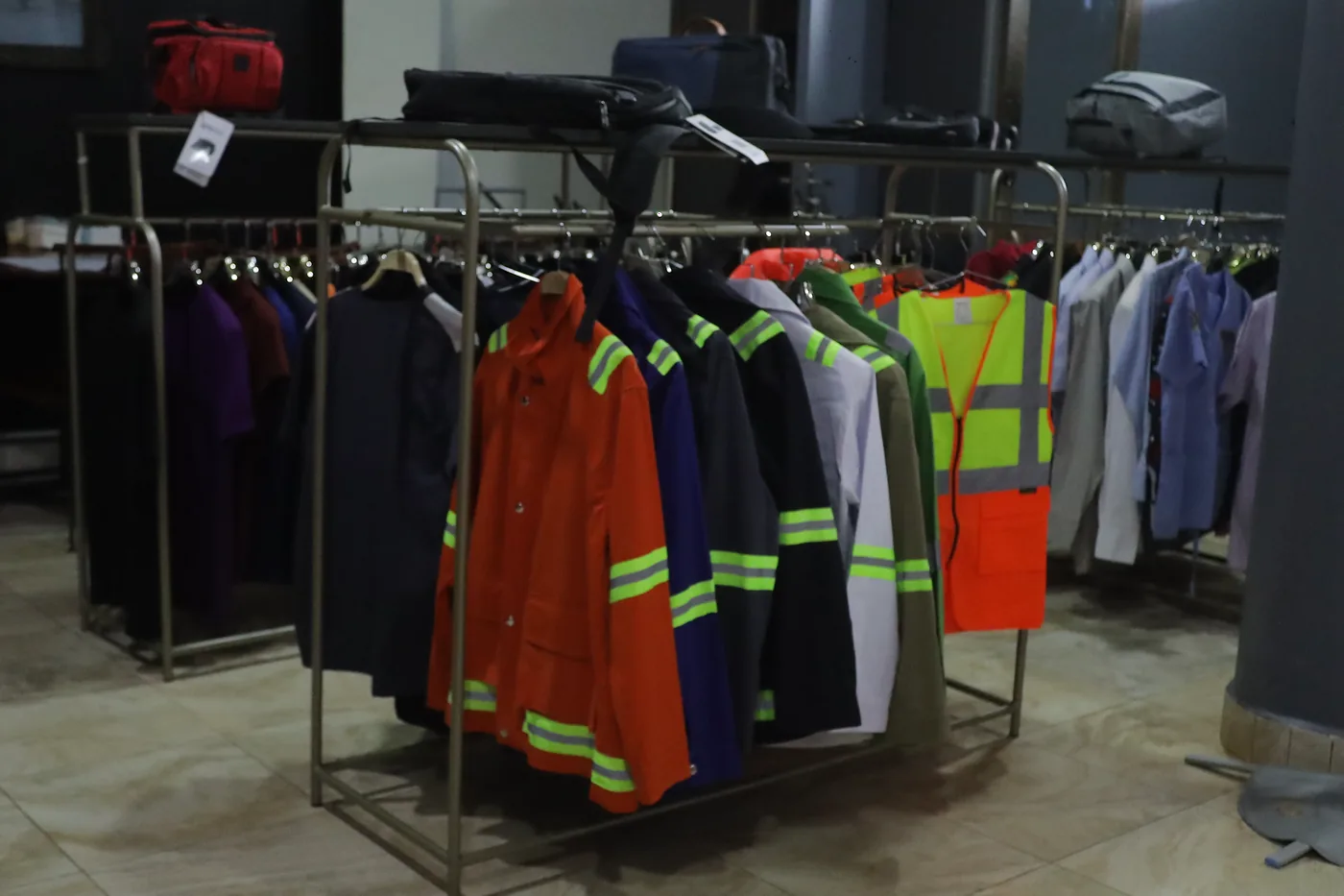 Hanging high-visibility workwear used as a site-team kit reference
